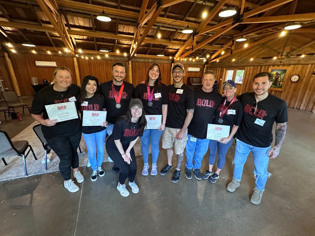 BOLD cohort in black BOLD shirts with red print