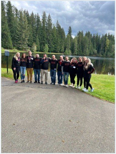 BOLD cohort standing in a line by the lake
