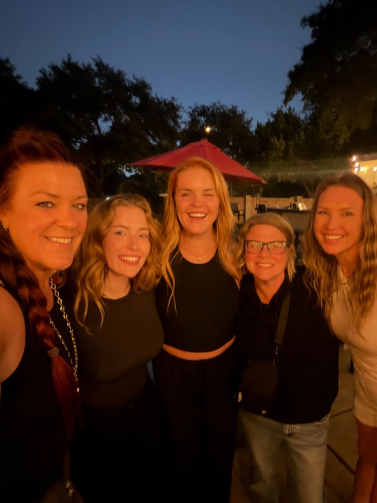 The women of CI Web Group together at an evening team gathering