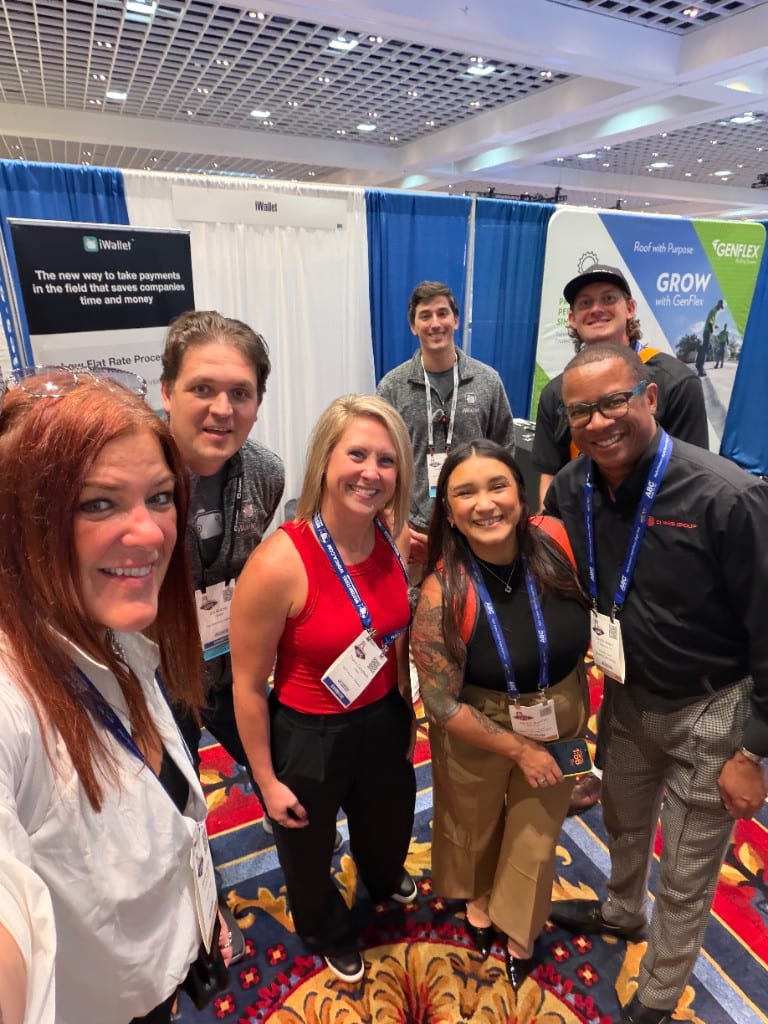 CI Web Group team and partners on the expo floor at the AHR Expo
