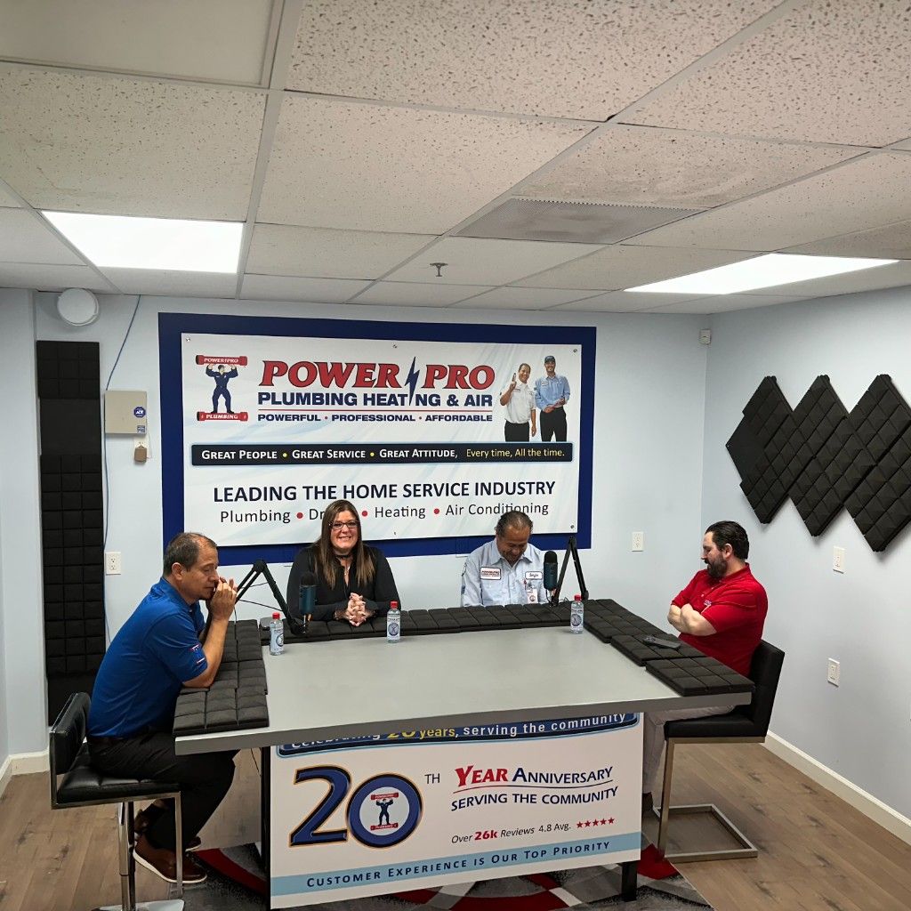 A client podcast being recorded on the Power Pro Plumbing studio set