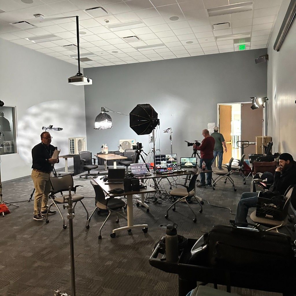 A CI Web Group video production studio with cameras and lighting rigs set up