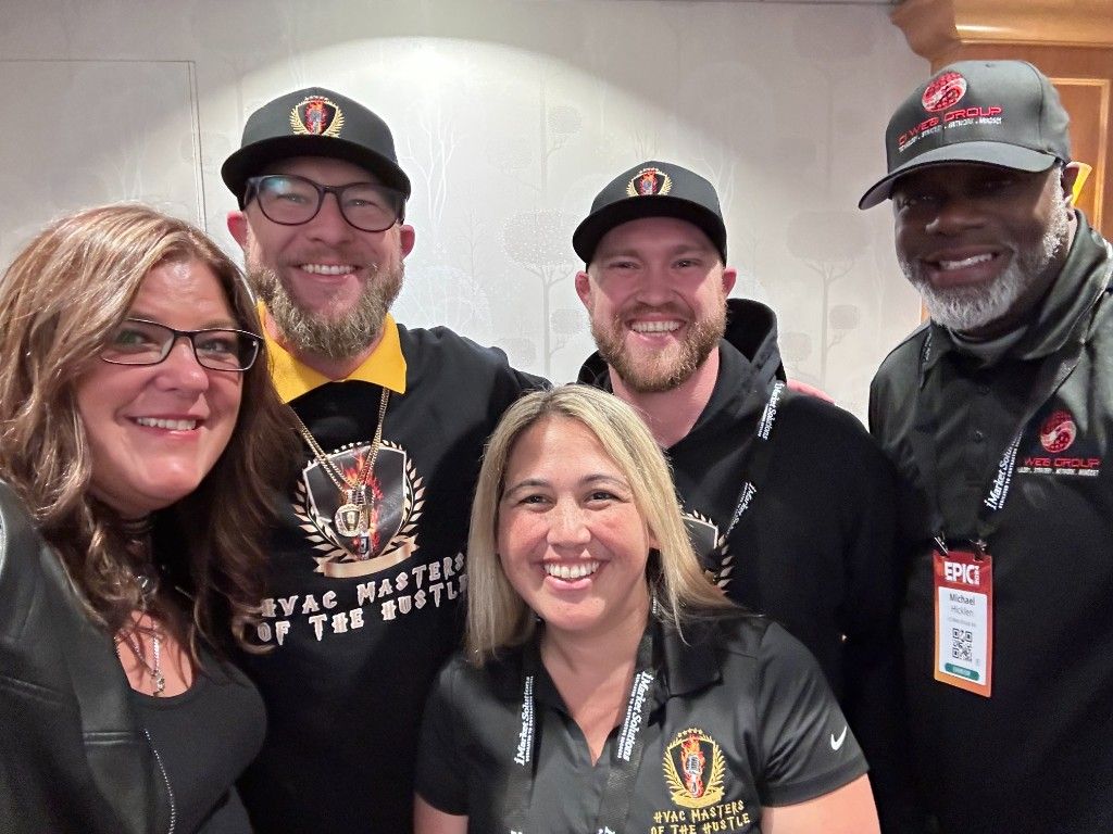 CI Web Group team members in 'Built by the Trades' apparel