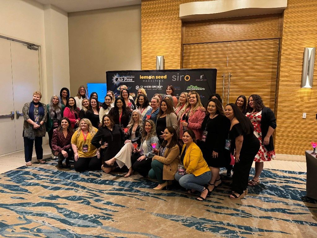 The full CI Web Group team posing together at a conference