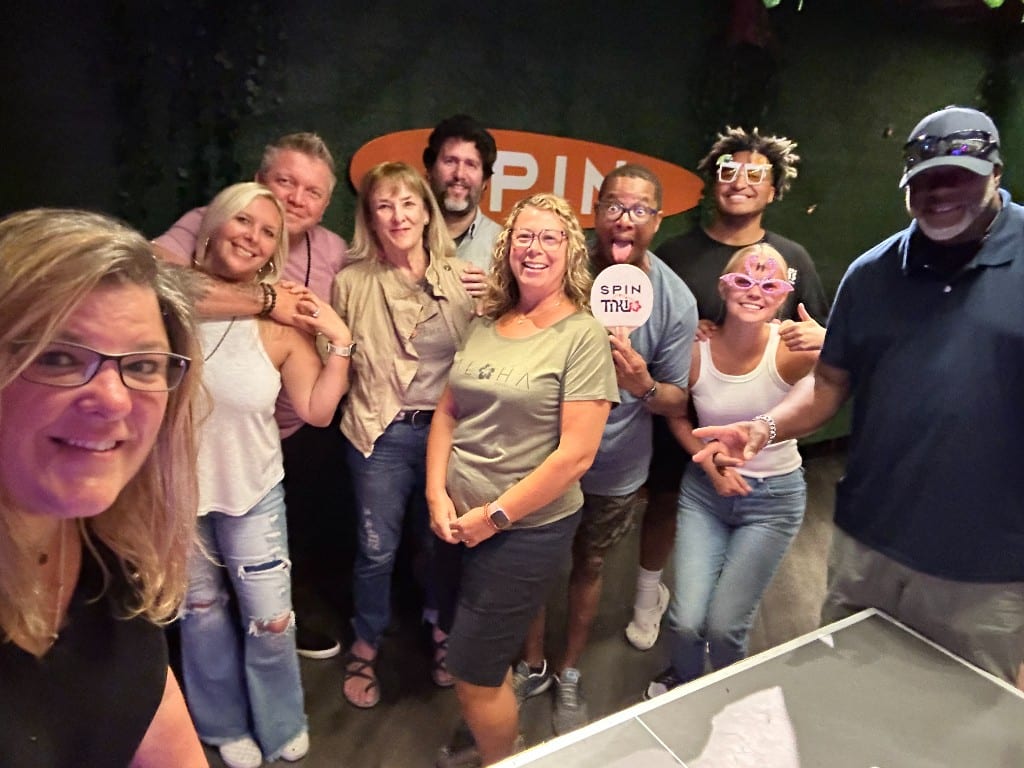 The CI Web Group team celebrating together at an evening gathering