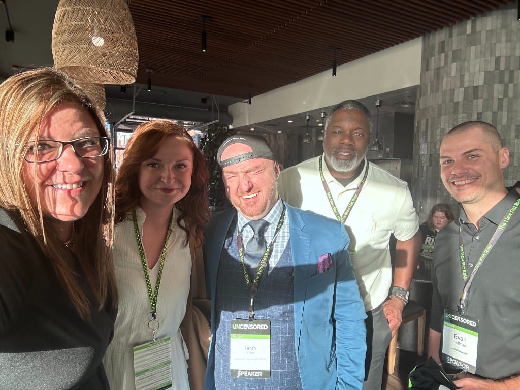 CI Web Group team with speakers at an industry 'Uncensored' event
