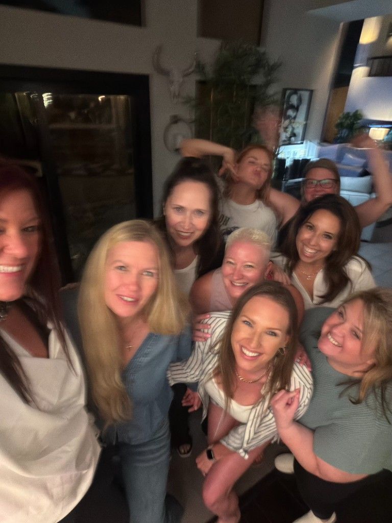 The women of CI Web Group together at an evening event
