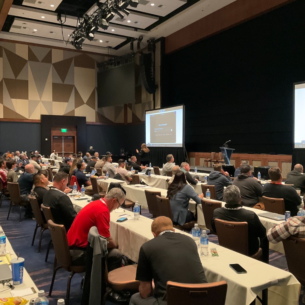 Contractors at a distributor dealer meeting session