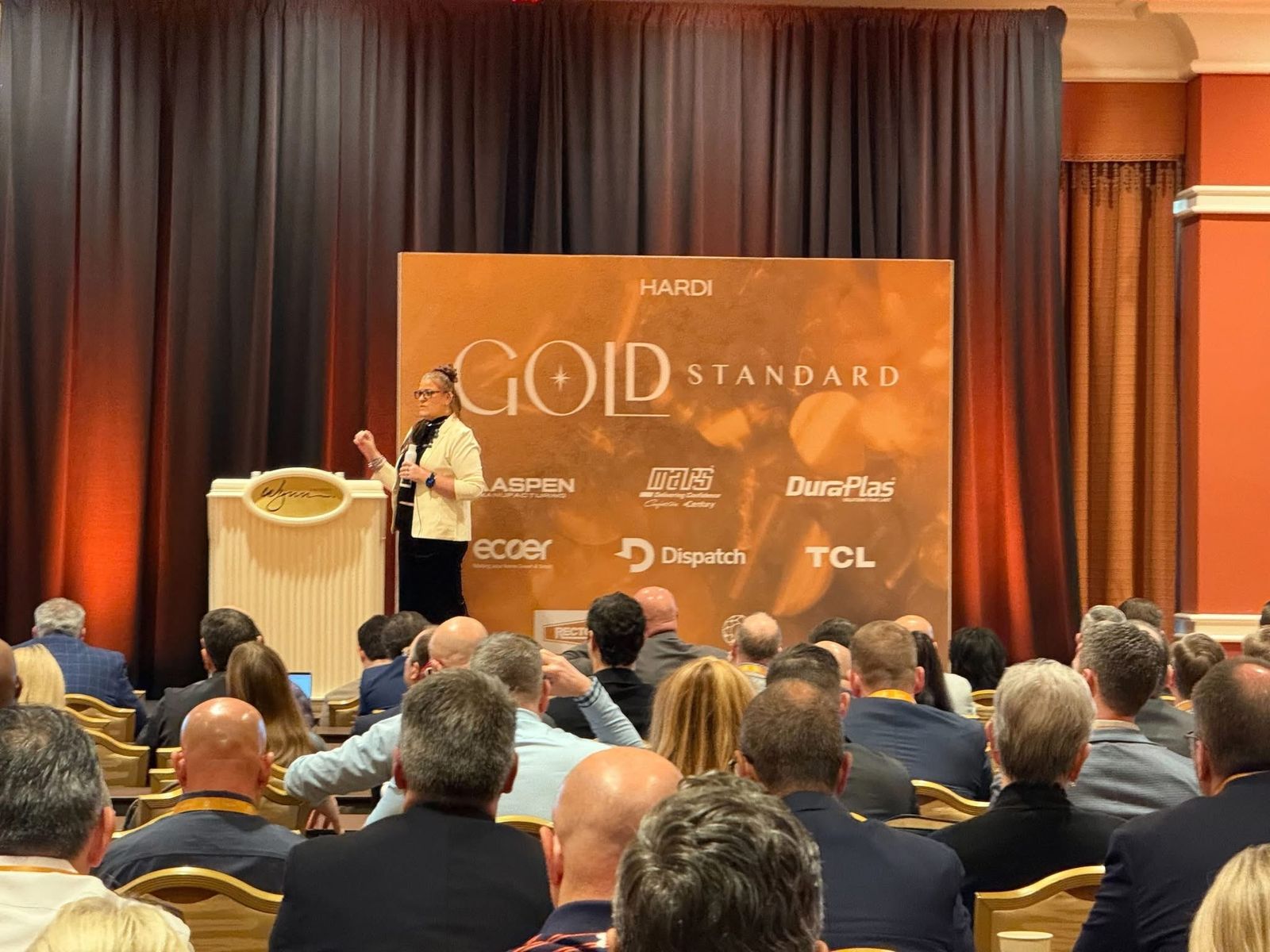 Jennifer Bagley speaking on stage at the HARDI Gold Standard event